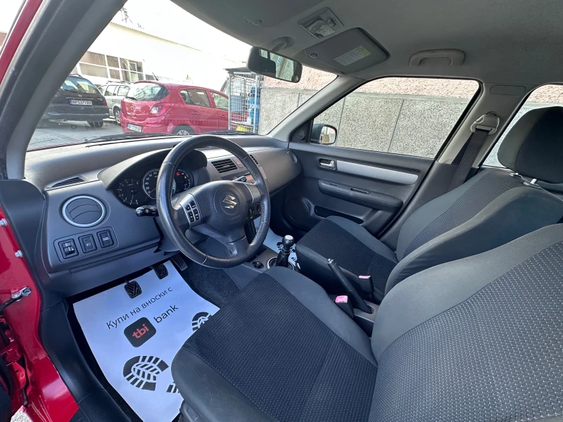 Suzuki Swift 1.3i - КЛИМАТИК - РЕАЛНИ КИЛОМЕТРИ, снимка 9 - Автомобили и джипове - 51996859