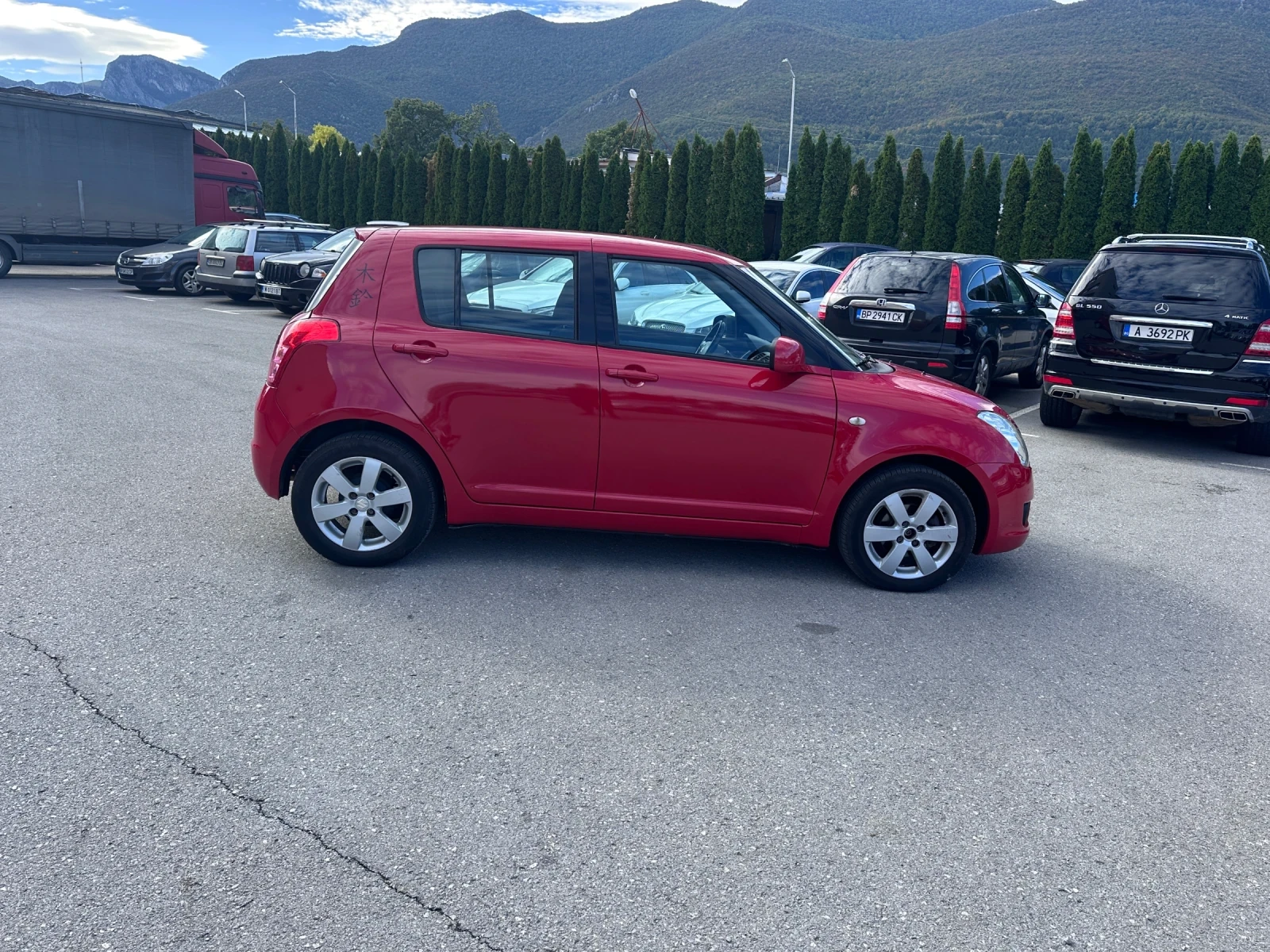 Suzuki Swift 1.3i - КЛИМАТИК - РЕАЛНИ КИЛОМЕТРИ - изображение 4