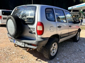 Chevrolet Niva 1.7i* ГАЗ BRC* 4х4* 2 КЛЮЧА* БЪРЗИ/БАВНИ* БЛОКАЖ*  - 3900 € / 7627.74 лв. - 75085107 4