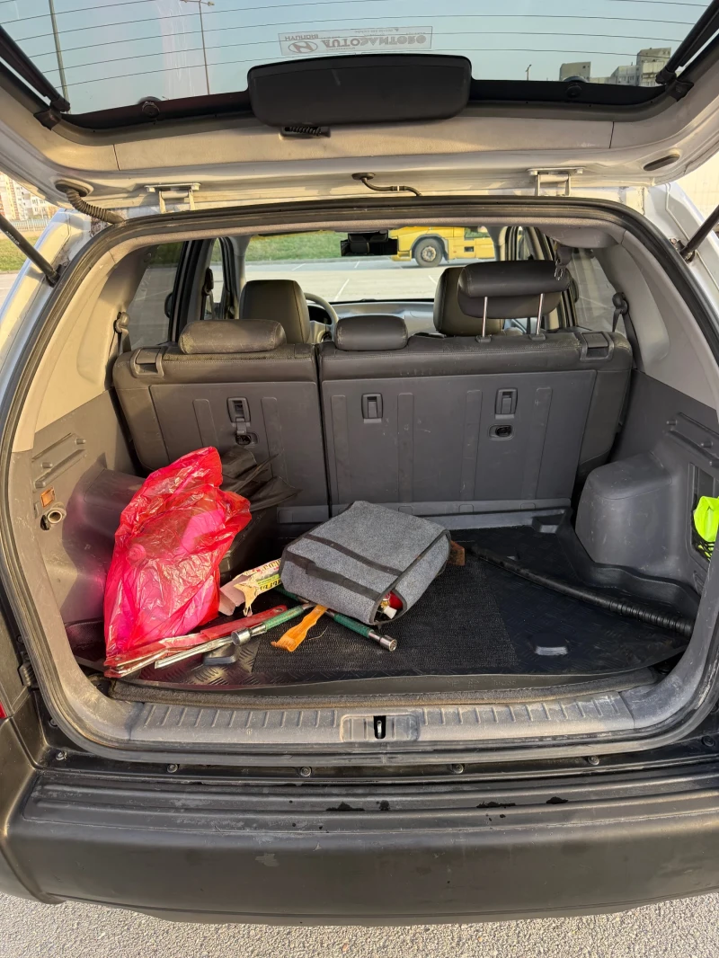 Hyundai Tucson 2.0 CRDI 4x4 климатик , снимка 13 - Автомобили и джипове - 52556970