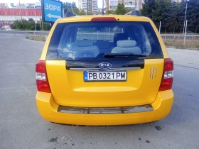 Kia Carnival 2.7i, снимка 6