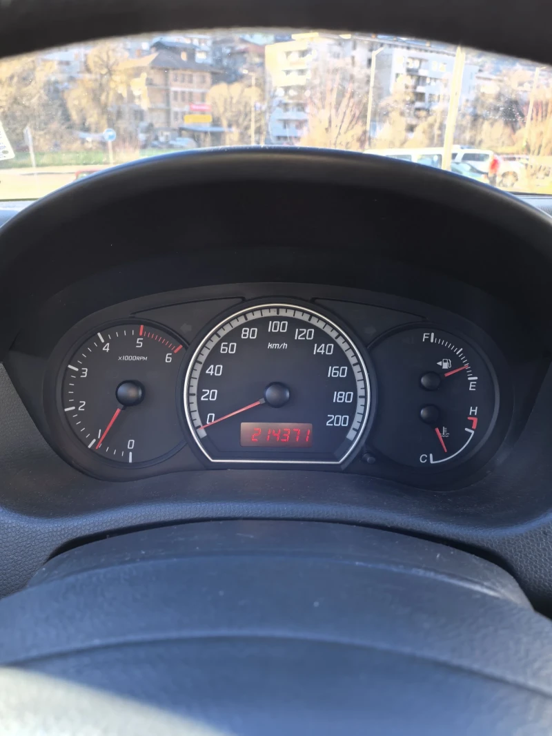 Suzuki Swift 1.3ddis, снимка 11 - Автомобили и джипове - 48522184