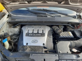 Hyundai Tucson 2.7 i, снимка 8 - Автомобили и джипове - 41181282
