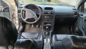 Opel Astra 1.4 90кс, снимка 4