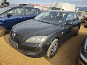 Mazda 3 1.4, снимка 1