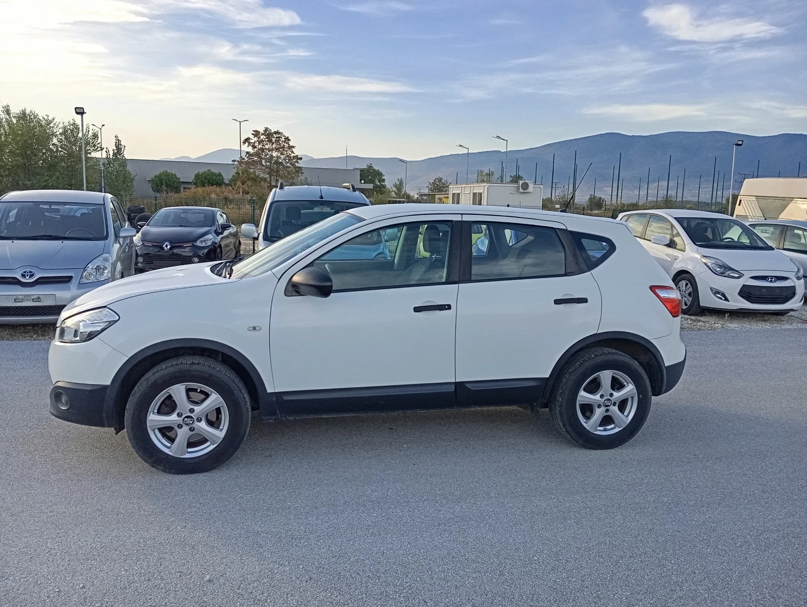 Nissan Qashqai 1.6 Газ -бензин - изображение 10