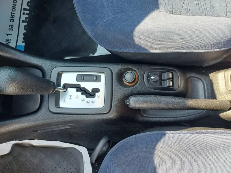 Peugeot 206 1.4 АТОМАТ, снимка 11 - Автомобили и джипове - 51409374