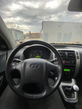 Hyundai Tucson 2.0 CRDi, снимка 4 - Автомобили и джипове - 45439877