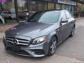 ������ Mercedes-Benz E 400