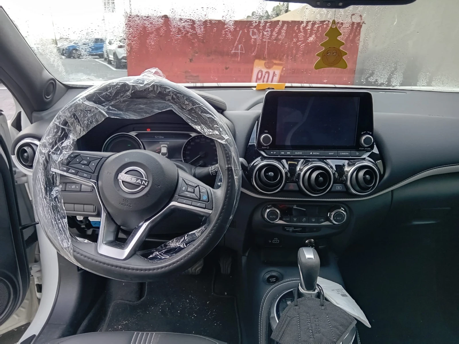 Nissan Juke 1.6 Hybrid 143к.с Tekna  - изображение 6