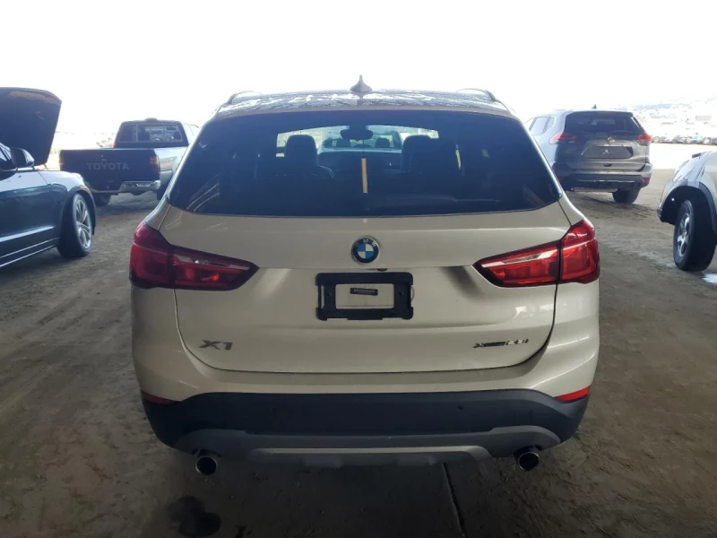 BMW X1, снимка 11 - Автомобили и джипове - 49290315