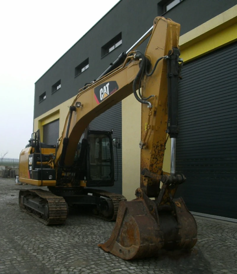 Багер Cat 323ELN