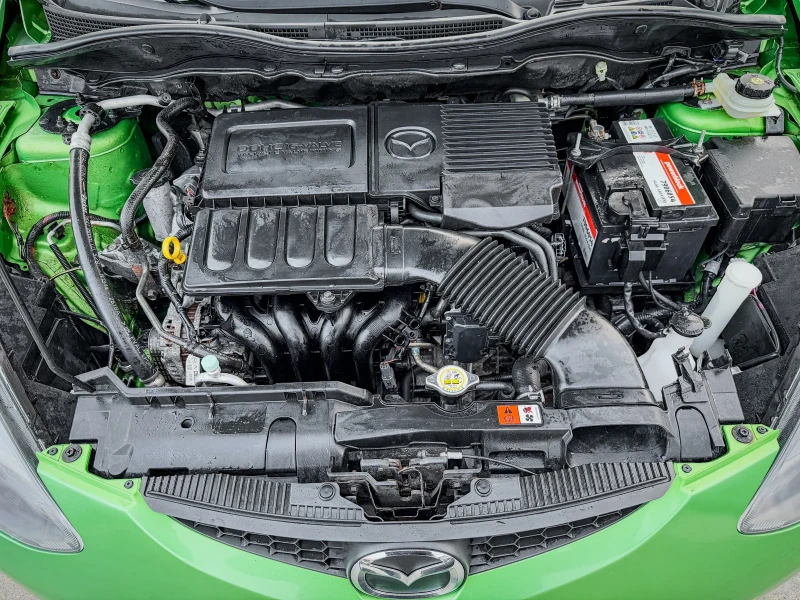 Mazda 2 1.4i - 75k.c., снимка 16 - Автомобили и джипове - 52367495
