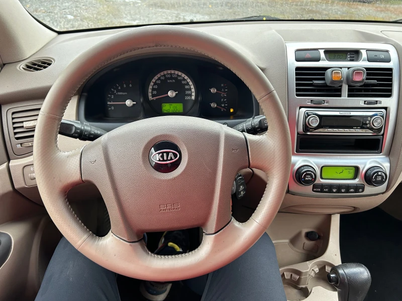 Kia Sportage 2.0-4/4.авт., снимка 9 - Автомобили и джипове - 47928510