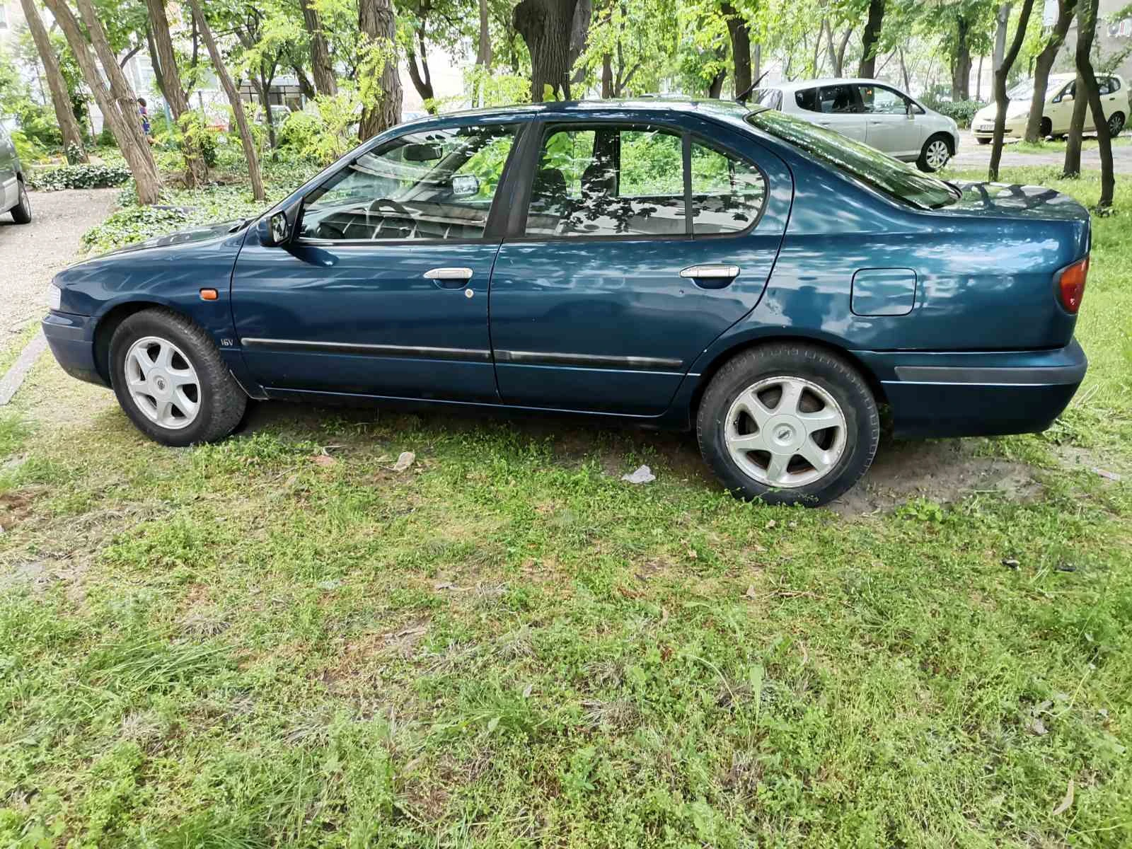 Nissan Primera 1.6 99к.с. - изображение 5
