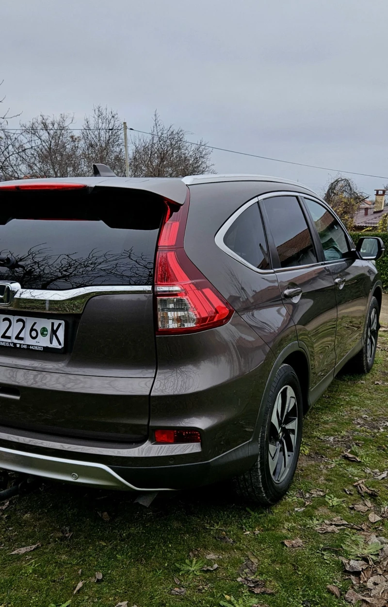Honda Cr-v 2.0 I-vtec 4x4 Executive , снимка 4 - Автомобили и джипове - 52675547