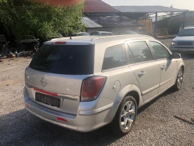 Opel Astra 1.6 i 105 к с автомат, снимка 5