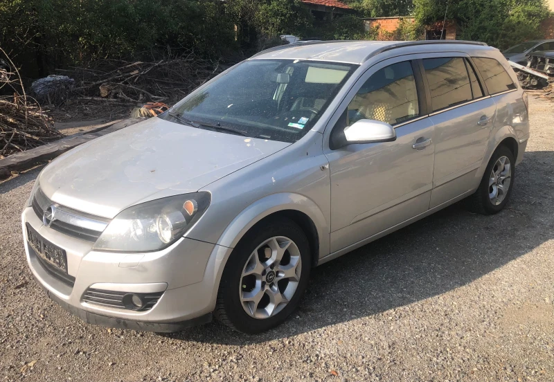 Opel Astra 1.6 i 105 к с автомат, снимка 3 - Автомобили и джипове - 47185230