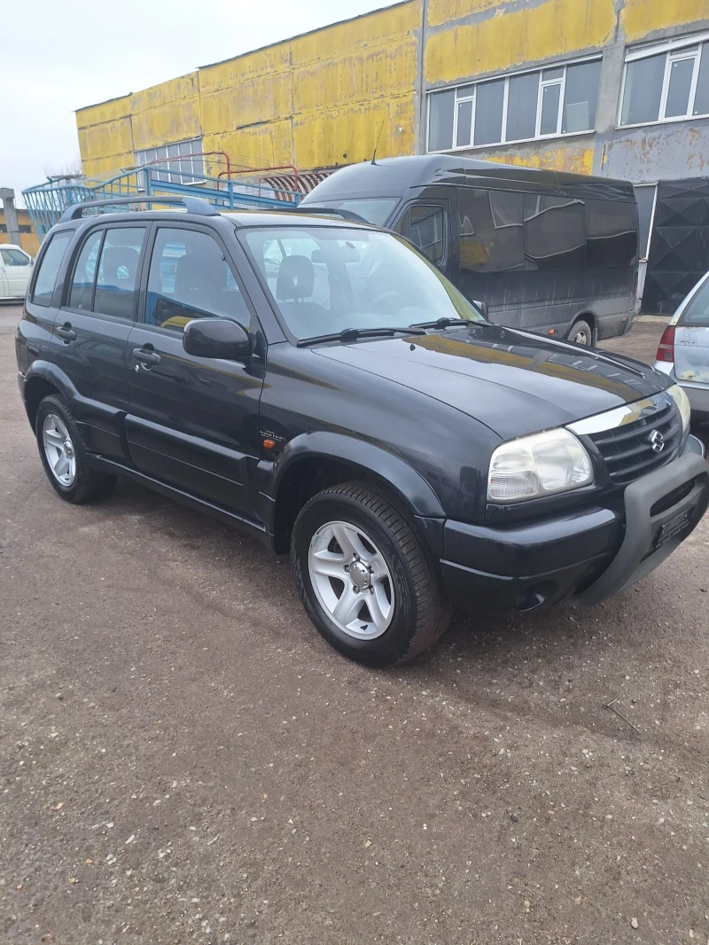 Suzuki Grand vitara 2.0 Б.128 К.С.НОВ ВНОС ШВЕЙЦАРИЯ., снимка 11 - Автомобили и джипове - 53500859