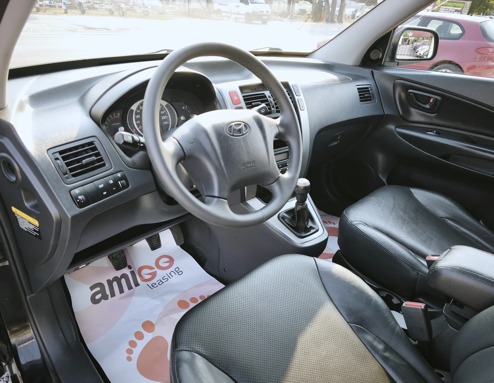 Hyundai Tucson 2.0i 4x2, снимка 8 - Автомобили и джипове - 56154285