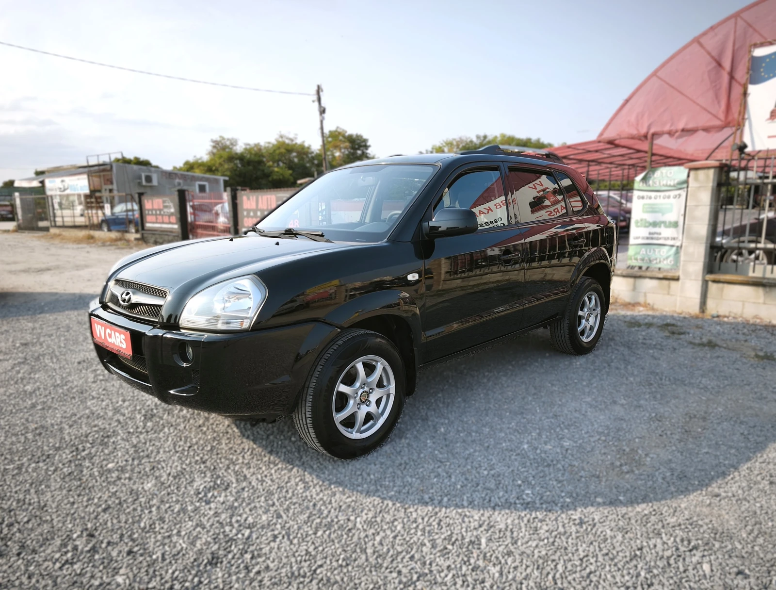 Hyundai Tucson 2.0i 4x2, снимка 7 - Автомобили и джипове - 56154285