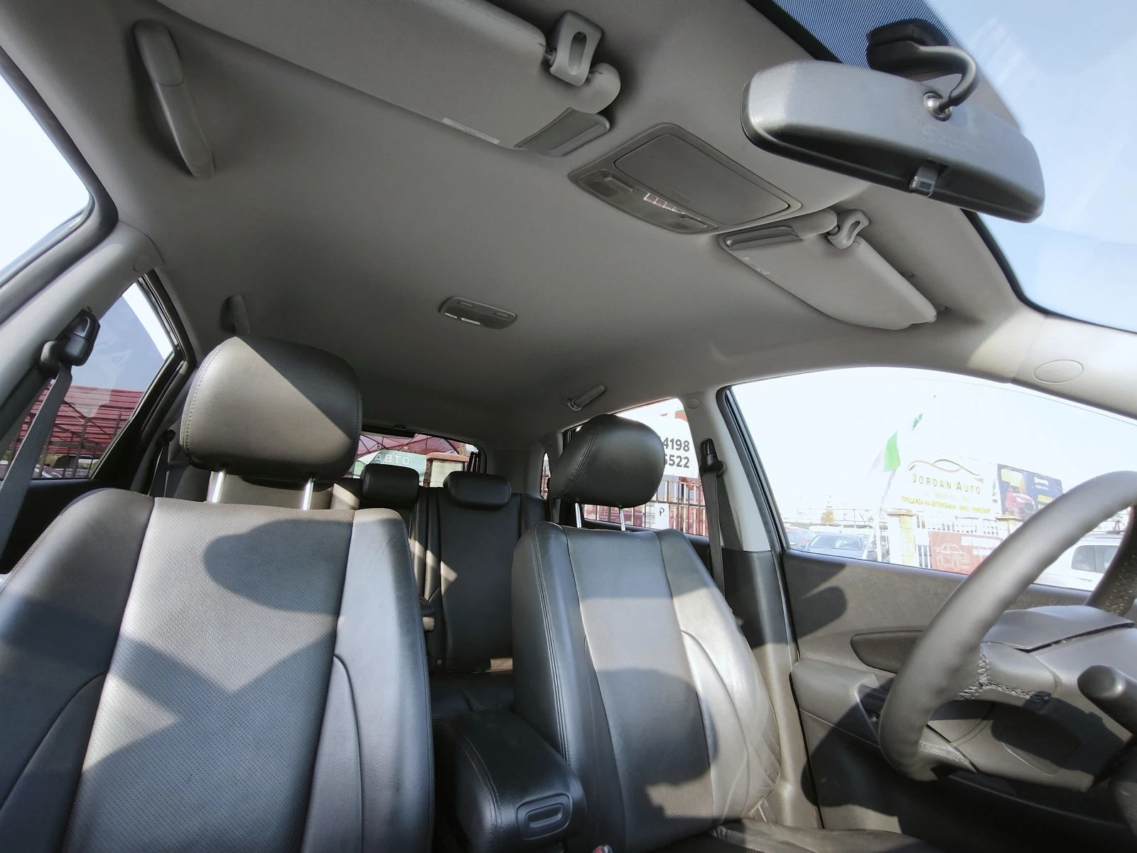 Hyundai Tucson 2.0i 4x2, снимка 16 - Автомобили и джипове - 56154285