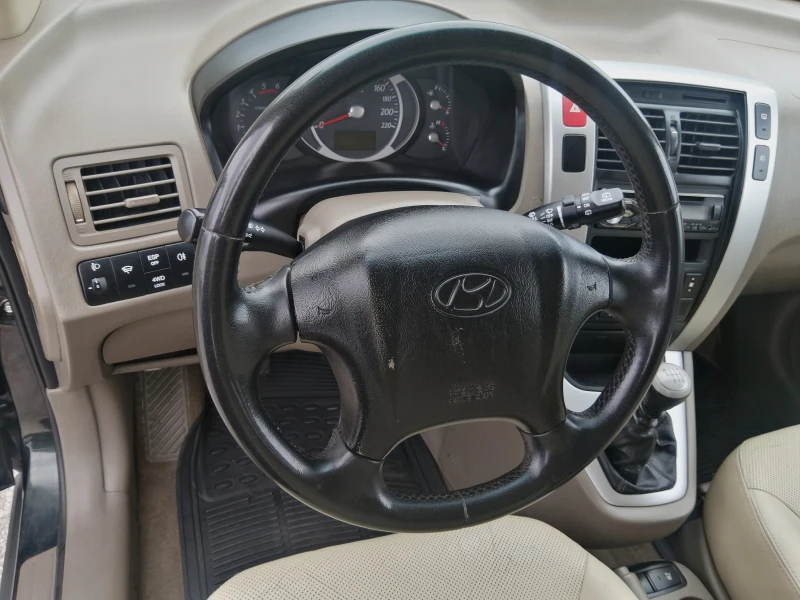 Hyundai Tucson 2.0 CRDI 4x4 140 к.с, снимка 10 - Автомобили и джипове - 47385152