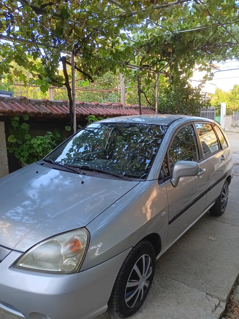 Suzuki Liana, снимка 6 - Автомобили и джипове - 49305366