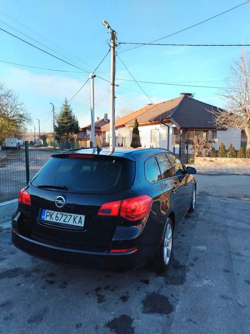 Opel Astra 1.3 CDTI, снимка 7 - Автомобили и джипове - 53247572