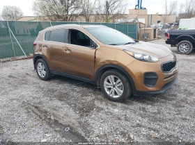 Kia Sportage 2.4L I-4 DI, DOHC, VVT, 181HP Front Wheel Drive