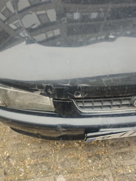 ������ Mazda Demio