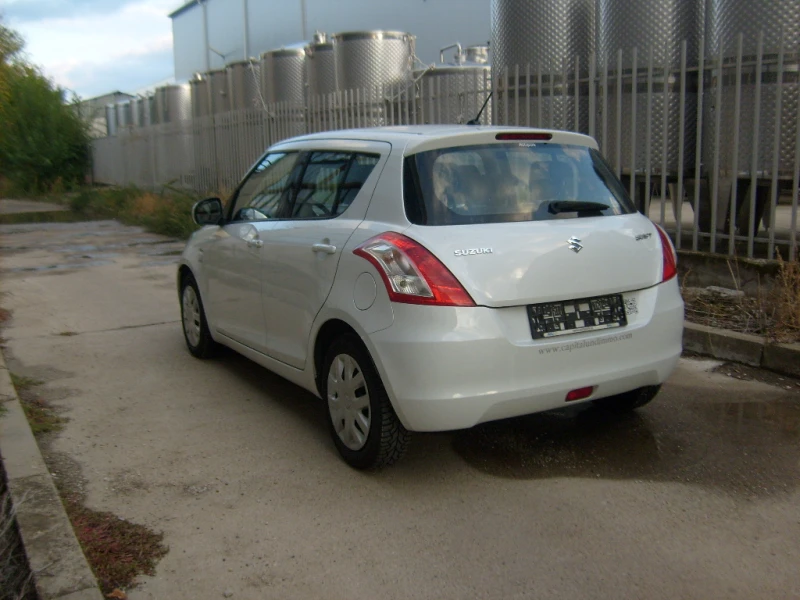 Suzuki Swift 1.3DDIS-ПЕРЛА, снимка 6 - Автомобили и джипове - 47489866