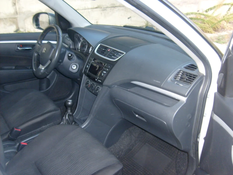 Suzuki Swift 1.3DDIS-ПЕРЛА, снимка 10 - Автомобили и джипове - 47489866