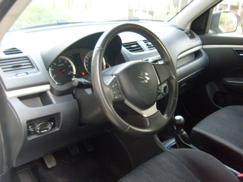 Suzuki Swift 1.3DDIS-ПЕРЛА, снимка 7 - Автомобили и джипове - 47489866