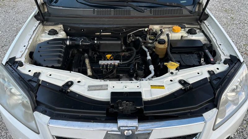 Chevrolet Captiva 2.4i газ 7 места, снимка 14 - Автомобили и джипове - 50404167