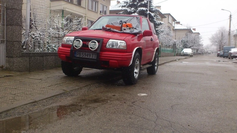 Suzuki Grand vitara, снимка 8 - Автомобили и джипове - 47390487