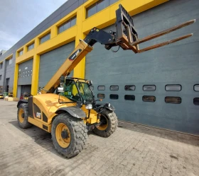 Телескопичен товарач Caterpillar TH408D, снимка 1