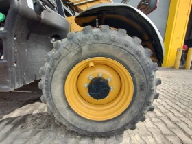 Телескопичен товарач Caterpillar TH408D, снимка 7