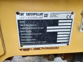 Телескопичен товарач Caterpillar TH408D, снимка 5