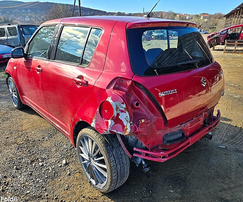 Suzuki Swift 1.3 4WD, снимка 7 - Автомобили и джипове - 52712529