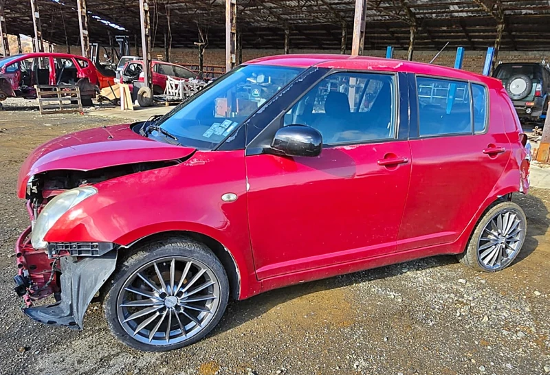 Suzuki Swift 1.3 4WD, снимка 3 - Автомобили и джипове - 52712529