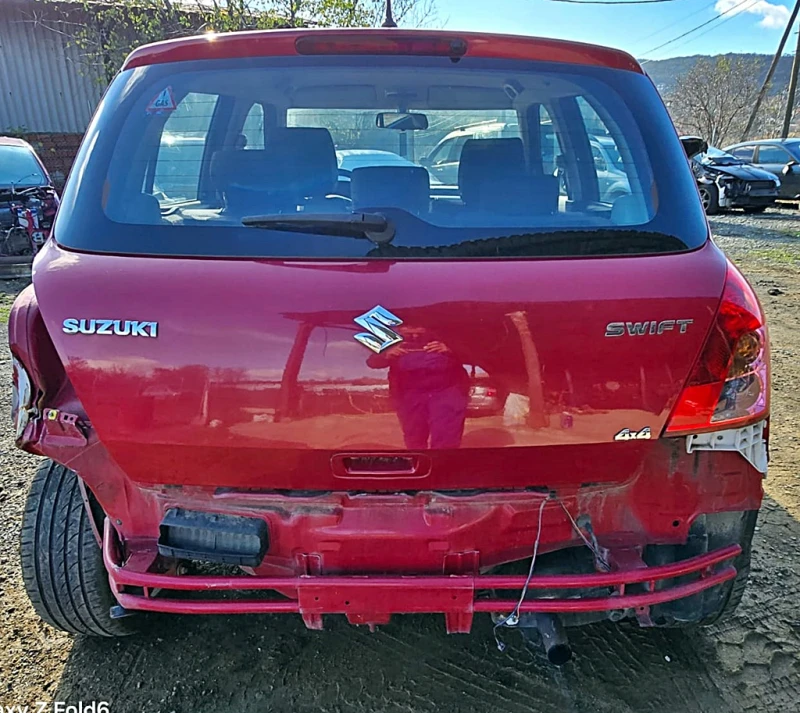Suzuki Swift 1.3 4WD, снимка 5 - Автомобили и джипове - 52712529
