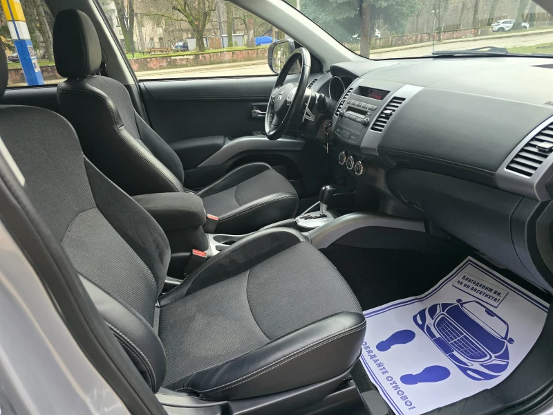 Mitsubishi Outlander 2.4i 4X4 ШВЕЙЦАРИЯ , снимка 11 - Автомобили и джипове - 52728062