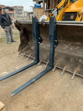 Допълнително оборудване Друг вид Вилици за всички комбинирани багери. , снимка 1