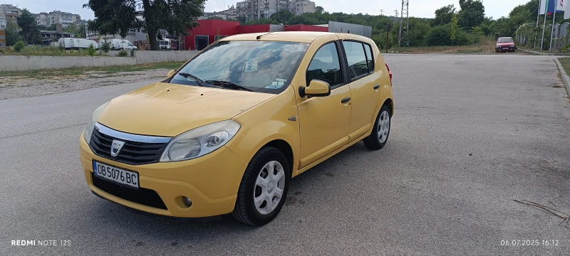 Dacia Sandero 1/4, снимка 9 - Автомобили и джипове - 53218395