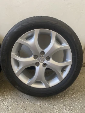        235/55R19  Mazda CX-7