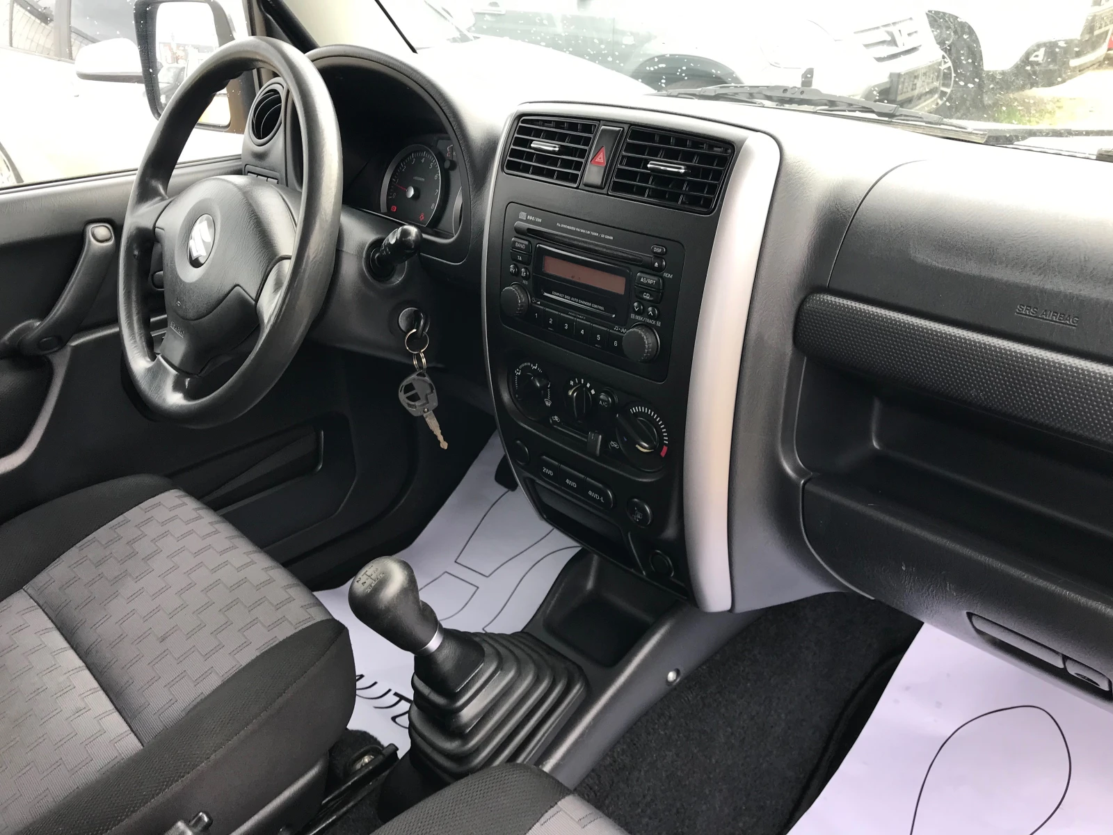 Suzuki Jimny 1.3i-4x4-face lift | Mobile.bg   12