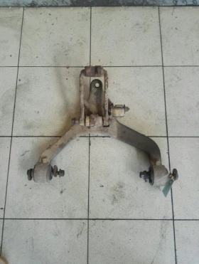 Носач преден ляв долен Чероки Спорт 2.5црд