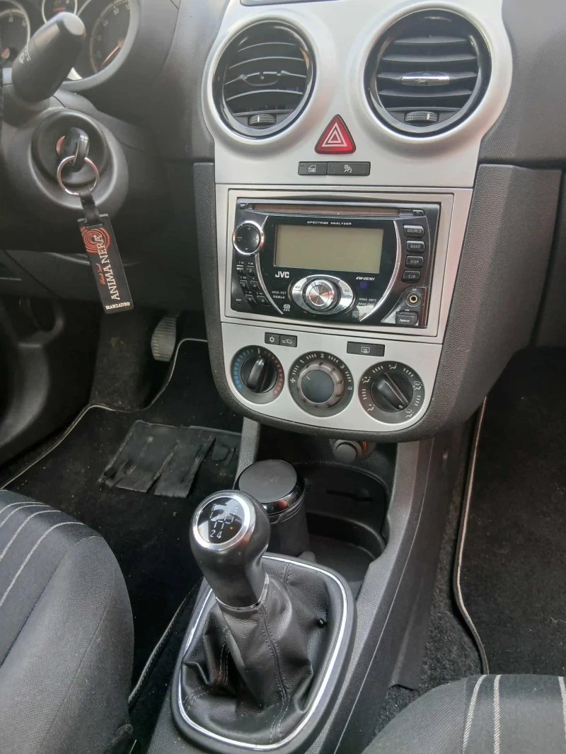 Opel Corsa, снимка 7 - Автомобили и джипове - 52425159