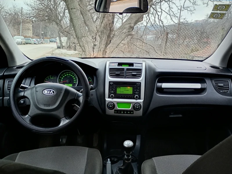 Kia Sportage 2.0 crdi, снимка 9 - Автомобили и джипове - 48995350